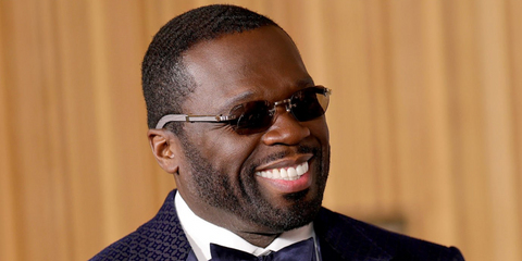 50 Cent was seen wearing gold and grey real wood Cartier CT0362S 005 rimless sunglasses at the New York premiere of new series "Fightland", July 2026.