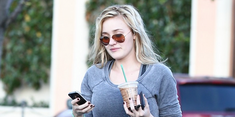 Musician and actress AJ Michalka was seen wearing gold Ray-Ban Aviator 3025 001/33 sunglasses with brown lenses in Calabasas.