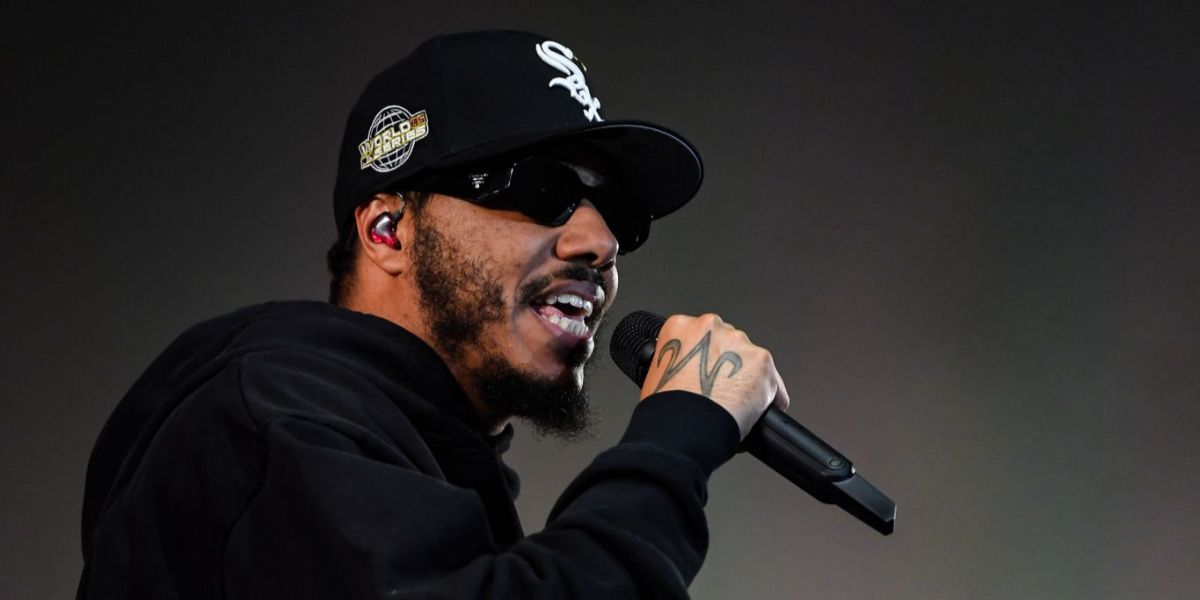 Rapper AJ Tracey was seen wearing black Prada PR 17WS 1AB5S0 Symbole Sunglasses at the KISS Haunted House Party 2022 in London.