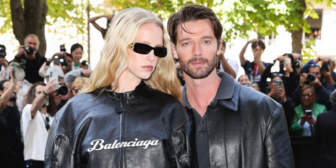 Model Abby Champion, pictured with fiancée Patrick Schwarzenegger, was seen wearing black Balenciaga BB0096S 001 rectangular sunglasses at the Balenciaga Haute Couture Fall/Winter 2025 fashion show during Paris Couture Week