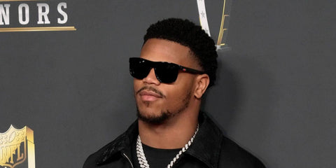 American football player Abdul Carter of New York Giants was seen wearing black Gucci GG0010S 001 sunglasses at the Annual NFL Honors 2026 in San Francisco.