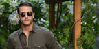 Menswear content creator Adam Gallagher was seen wearing gold Ray-Ban Round Metal 3447 001 sunglasses in a social media post