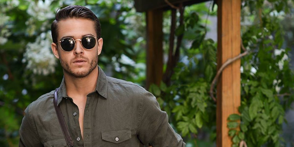Menswear content creator Adam Gallagher was seen wearing gold Ray-Ban Round Metal 3447 001 sunglasses in a social media post