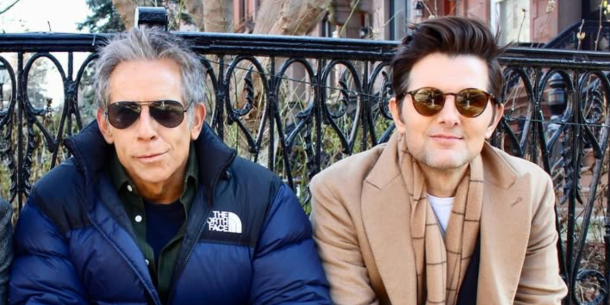 Actor Adam Scott, pictured on the right alongside Ben Stiller, was seen wearing dark tortoiseshell Ray-Ban RB 2180 710/83  round sunglasses with brown Polarised lenses on the set of Severance season 2
