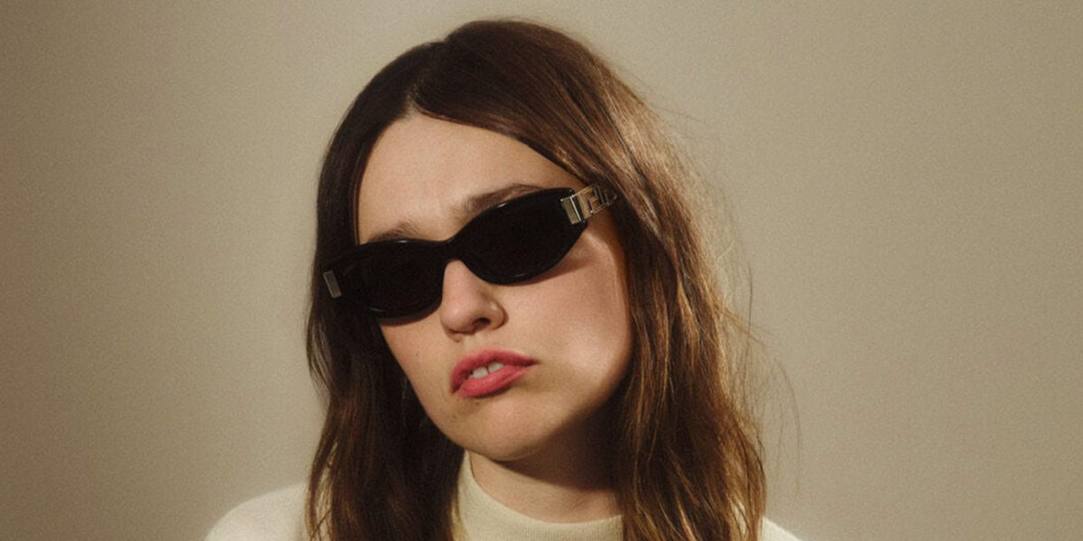 Aimee Lou Wood was seen wearing black Versace 4501 GB1/87 sunglasses in the Versace Greca Eyewear campaign, October 2025.
