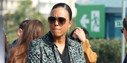 Actress Aisha Tyler was seen wearing gold Gucci GG0062S 003 aviator sunglasses with green and red webbing details at the "The Walking Dead" Photocall during the Mipcom Cannes, October 2025. Shop online now on Pretavoir