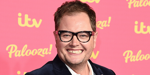 Alan Carr is seen wearing tortoiseshell Tom Ford TF5040-B 052 Blue Control optical glasses to attend the ITV Palooza event in London