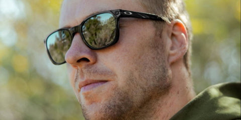 Norwegian alpine ski racer Aleksander Kilde was seen wearing black Oakley Ojector OO9018 04 Prizm Polarised sunglasses.