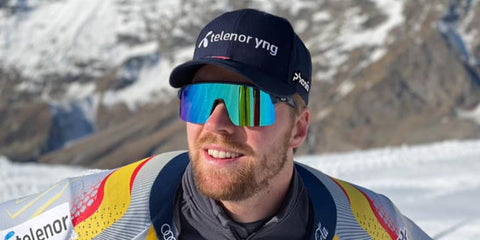 Norwegian alpine ski racer Aleksander Kilde was seen wearing black Oakley Sutro Lite OO9463 15 sunglasses with Prizm sapphire lenses in Oakley's social media post, December 2020.