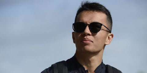 Alex Albon wears Persol 3210S 95/31 sunglasses in Black