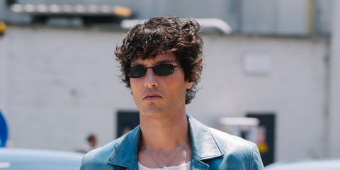 Spanish model and actor Alex Sanchez de Mora was seen wearing black Prada PR B54S 1AB5Z1 Polarised sunglasses at the Prada Menswear Spring/Summer 2026 fashion show during Milan Men's Fashion Week.