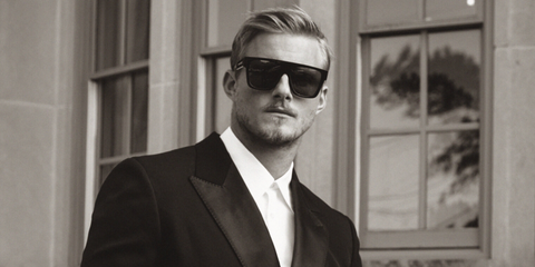 Alexander Ludwig was seen wearing black Alexander McQueen AM0302S 001 square sunglasses in a fashion editorial page of Flaunt Magazine