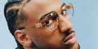 Alexandre Sarr modeled Versace 1283 1002 optical glasses for the brand's Fall/Winter 2024 campaign