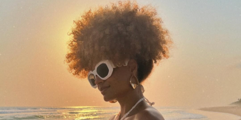 Model, singer, and Miss France 2017 titleholder Alicia Aylies was seen wearing white Versace 4425U 314/6G Maxi Medusa Biggie sunglasses in her Instagram post, January 202.
