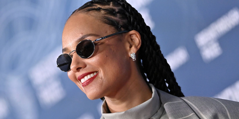 Alicia Keys was seen wearing silver Persol Ida 1018S 518/B1 oval sunglasses with grey lenses at the 11th Breakthrough Prize Ceremony in Santa Monica, April 2025.