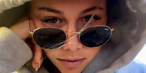 Professional tennis player Amanda Anisimova was seen wearing gold Ray-Ban Round Metal 3447 001 sunglasses in a social media post, April 2024. Shop online now on Pretavoir