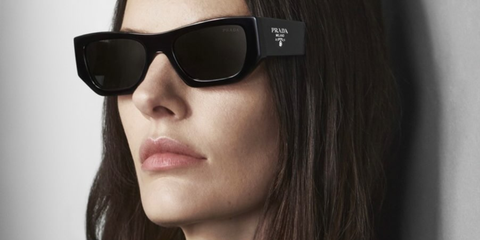 Model Amanda Murphy was seen wearing black Prada PR A01S 16K08Z sunglasses in the Prada Eyewear Fall/Winter 2023