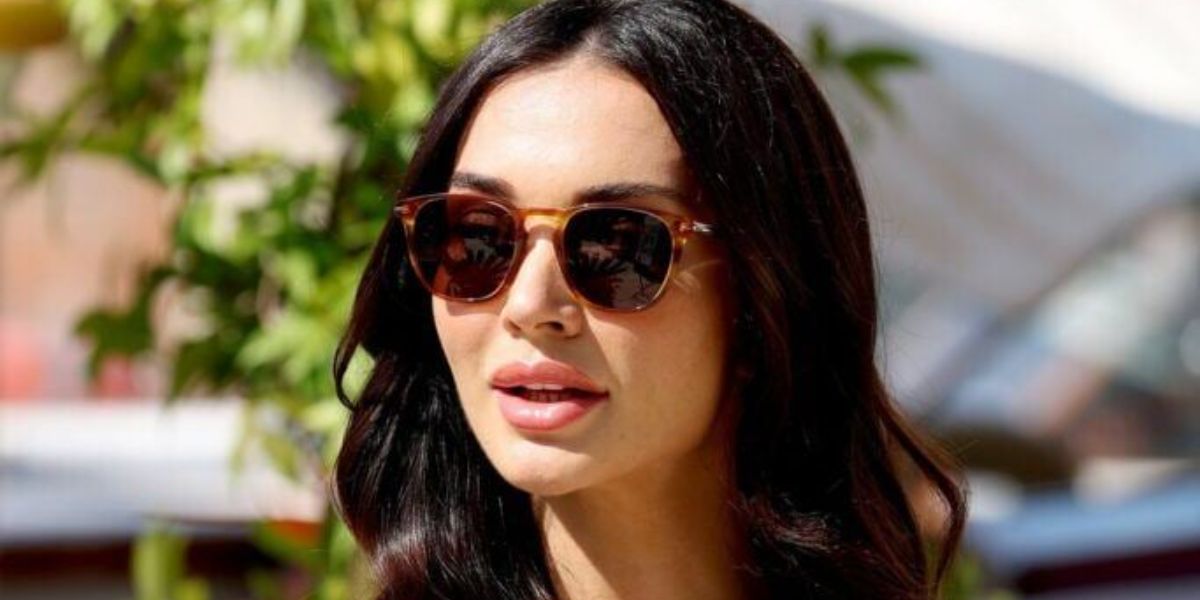 Amy Jackson was seen wearing transparent brown David Beckham DB 1160/S EX470 sunglasses with brown lenses to attend the 2024 Venice Film Festival