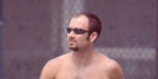 Andre Agassi was seen wearing the original black Oakley Eye Jacket Redux OO9438 01 Prizm sunglasses at the Australian Open 1995, photographed by Juergen Hasenkopf
