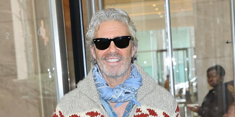Celebrity host Andy Cohen was seen wearing the iconic Ray-Ban Wayfarer 2140 901 Black sunglasses in New York City, March 2026.