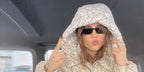 Angelina Mango was seen wearing Ray-Ban Lady Burbank RB 2299 901/31 cat eye sunglasses in her Facebook post