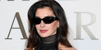 Anne Hathaway was seen wearing black Ralph Lauren RL8231U 5001/87 sunglasses at the Ralph Lauren Fall/Winter 2026 fashion show during New York Fashion Week.
