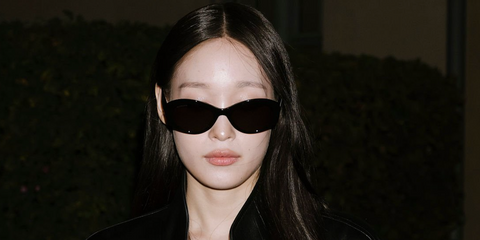South Korean singer Annie Moon of AllDay Project was seen wearing black Balenciaga BB0477SA 001 sunglasses at the Balenciaga Spring/Summer 2026 show during Paris Fashion Week.