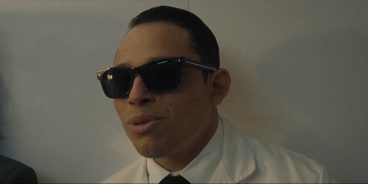 Celebrity actor and singer Anthony Ramos was seen wearing black Prada PR A17S 16K731 square sunglasses in 2026 series FX The Beauty as The Assassin
