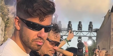 Italian DJ and record producer Matteo Milleri, widely known as Anyma, was seen wearing black Ray-Ban Xan RB 4431 66776V wraparound sunglasses at the Afterlife Tulum 2024.