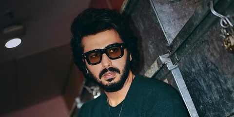 Bollywood actor Arjun Kapoor was seen wearing Cutler and Gross Sun 1402 01 Yellow on Black sunglasses in 2024.