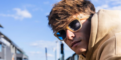 Arthur Leclerc was seen wearing beige Ray-Ban Wayfarer Reverse RB R0502S 6780/72 sunglasses with blue lenses in his Instagram post, June 2025.