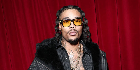 Italian rapper Artie 5ive was seen wearing black Burberry Knight BE4358 300185 sunglasses with yellow lenses at the PDF Menswear Fall/Winter 2026 fashion show during Milan Men's Fashion Week.