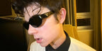 Ashby Gentry was seen wearing black Prada PR 26ZS 16K08Z cat eye sunglasses in Alberta, Canada, December 2023.