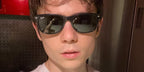 Ashby Gentry was seen wearing the iconic Ray-Ban New Wayfarer RB 2132 901 sunglasses in his Instagram post, December 2022.