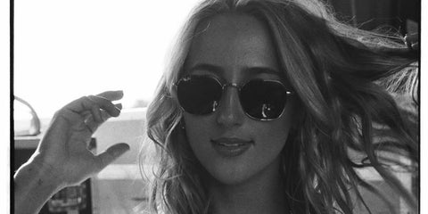 American country singer Ashley Cooke was seen wearing Ray-Ban Jim RB 3694 001/31 sunglasses in her Instagram post, November 2025.