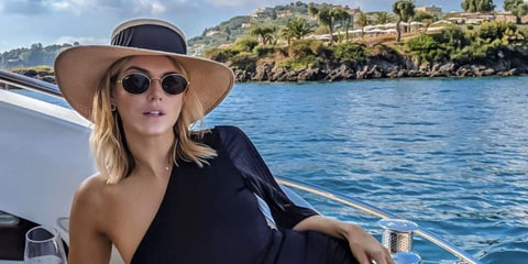 British TV personality Ashley James was seen wearing gold Ray-Ban Oval RB 3547 001/31 sunglasses