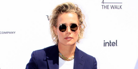 Former professional footballer Ashlyn Harris was seen wearing gold Gucci GG1649S 007 round sunglasses at the Parity Paris Show at Opera Garnier in Paris, July 2024. Shop online now on Pretavoir