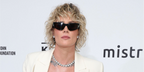 Former professional footballer Ashlyn Harris wore black Saint Laurent Sun SL 634 Nova 001 sunglasses at the Elton John AIDS Foundation's 34th Annual Academy Awards Viewing Party