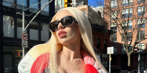 Singer-songwriter Ava Max was seen wearing black Prada PR 17WS 1AB5S0 Symbole Sunglasses in her Instagram post, February 2023. Shop online now on Pretavoir