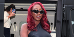 French-Malian singer Aya Nakamura was seen wearing black Balenciaga BB0157S 001 sunglasses at the Balenciaga Spring/Summer 2023 fashion show during Paris Fashion Week