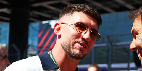 Spanish footballer Aymeric Laporte was seen wearing gold Cartier CT0465S 004 sunglasses with brown yellow gradient lenses at the F1 Spanish Grand Prix 2026