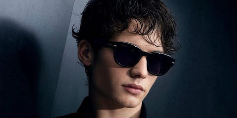 French influencer Bach Buquen was seen wearing black Hugo Boss 1717/S QF61I sunglasses in his Instagram post, September 2024.
