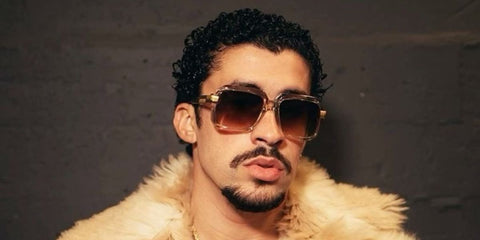 Bad Bunny was seen wearing grey-beige transparent Cazal Legends 607/3 009 square sunglasses with brown gradient lenses