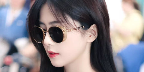 Chinese actress Bai Lu was seen wearing gold and black Balmain Brigade- I BPS-110A round sunglasses with green lenses during Paris Fashion Week season Fall/Winter 2023. Shop online now on Pretavoir
