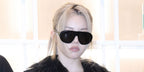 Singer and rapper Bailey Sok of AllDay Project was seen wearing black Prada PR C05S 16K08Z sunglasses at the VT Cosmetics "Skin Fitness Center" Seongsu pop-up store opening in Seoul, December 2025.