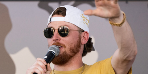 American country singer Bailey Zimmerman was seen wearing Ray-Ban RB 3548N 001 Hexagonal Gold With Flat Lenses sunglasses at the Stagecoach Festival 2024 in Indio, California