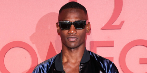 Muay Thai artist Bampara Kouyate was seen wearing black Saint Laurent SL 572 001 sunglasses at an Omega House Paris event in July 2024.