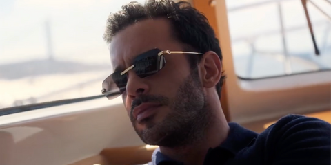 Turkish actor Baris Arduc was seen wearing gold Cartier CT0271S 001 rectangular rimless sunglasses in an Elle Man Arabia feature, October 2025.