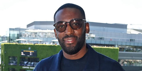 Rapper and actor Ashley Thomas, widely known as Bashy, was seen wearing Giorgio Armani AR8233U 5042/1 sunglasses at the Wimbledon Tennis Championships 2025. Shop online now on Pretavoir