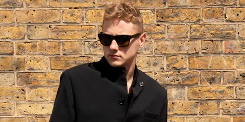 Actor Ben Hardy was seen wearing tortoiseshell Oliver Peoples N.04 Sun OV5552SU 1741/57 Polarised square sunglasses in a fashion editorial page of 1883 Magazine, August 2024